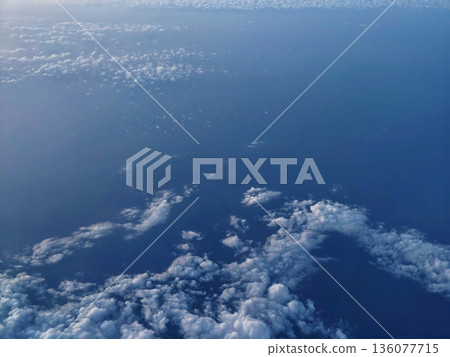 Peaceful sky with clouds, Soothing sky panorama with soft blue shades and cotton clouds during dawn 136077715