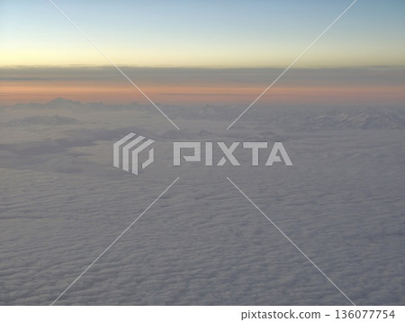 Sunrise sky with tranquil mood, Calm morning sky with warm and cool tones giving peaceful atmosphere 136077754