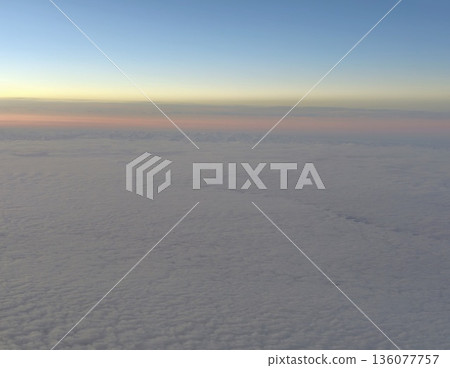 Twilight skies shift hues wildly, Remote sensing capturing expansive clouds and vibrant sunset hues Twilight skies shift hues wildly, Remote sensing capturing expansive clouds and vibrant sunset hues 136077757