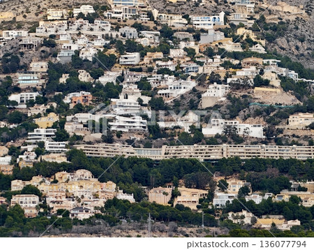 Bright hillside villas, Charming hillside residences surrounded by gardens and winding streets Bright hillside villas, Charming hillside residences surrounded by gardens and winding streets 136077794