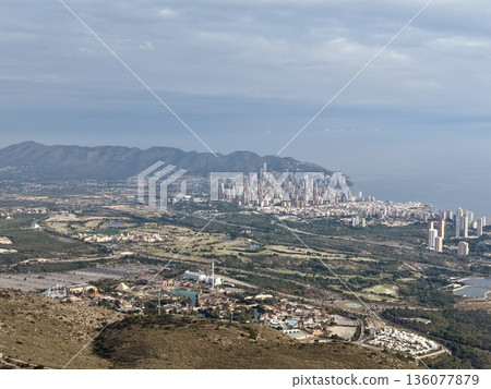 Elevated perspective of coastal city life, Vibrant urban environment with ocean and island views above Elevated perspective of coastal city life, Vibrant urban environment with ocean and island views above 136077879