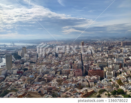 Skyline with harbor, City view with water and mountains, Urban scene featuring rooftops and distant hills Skyline with harbor, City view with water and mountains, Urban scene featuring rooftops and distant hills 136078022
