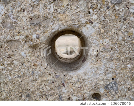 Highresolution capture of weathered sandstone with circular voids and nuanced tonal differences 136078046