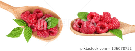 Ripe raspberries in wooden spoon isolated on a white background. Top view. Flat lay 136078731