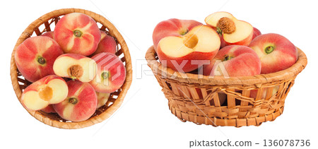 chinese flat donut peaches in a wicker basket isolated on white background. Top view. Flat lay chinese flat donut peaches in a wicker basket isolated on white background. Top view. Flat lay 136078736