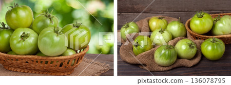 unripe green tomatoes in a wicker basket on wooden table with blurred background 136078795