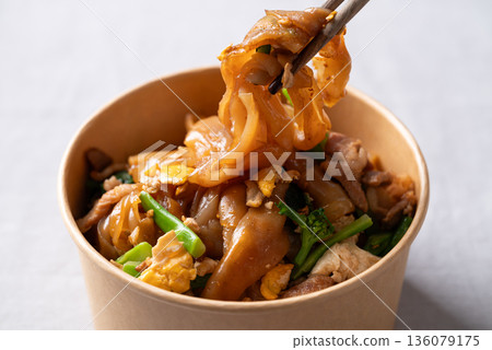 Thai food (Pad See Ew), Stir-fried rice noodles with soy sauce, pork, egg, and kale 136079175