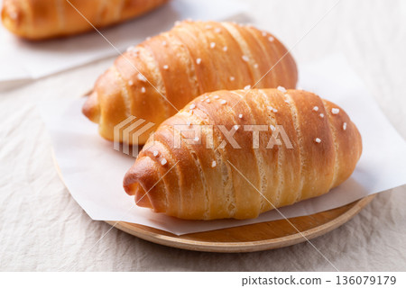 Salt bread (Shio pan) with sea salt flakes, Japanese bakery style Salt bread (Shio pan) with sea salt flakes, Japanese bakery style 136079179