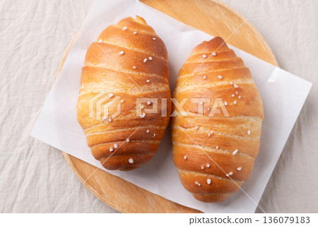 Top view of Salt bread (Shio pan) with sea salt flakes, Japanese bakery style 136079183