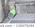 Empty cans littered in the staircase drain 136079284