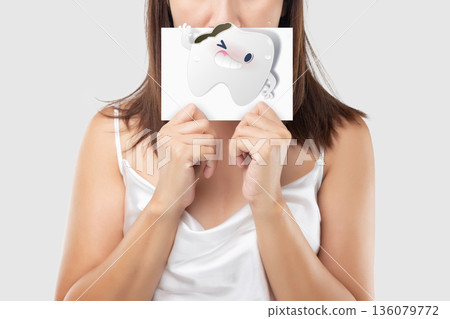 Tooth Decay and Pain Concept with Woman Holding Broken Tooth Cartoon 136079772
