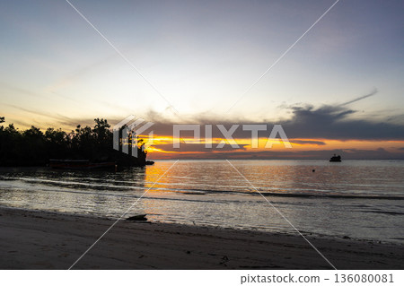 Sunset on Lia beach, Waleakodi Island, Togian archipelago, Sulawesi, Indonesia Sunset on Lia beach, Waleakodi Island, Togian archipelago, Sulawesi, Indonesia 136080081