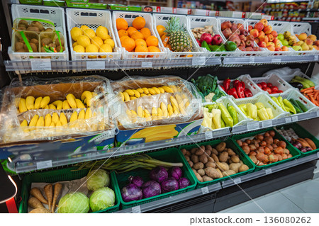 Fresh fruits and vegetables displaying on supermarket shelves Fresh fruits and vegetables displaying on supermarket shelves 136080262