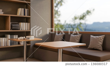 Wooden stool table and long bench with cushion pillows below glass window aside bookshelf in a cafe. Wooden stool table and long bench with cushion pillows below glass window aside bookshelf in a cafe. 136080317