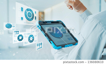 Engineer using tablet and digital data image 136080610