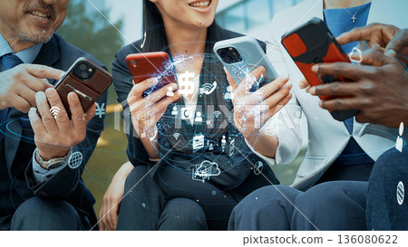 Image of people using smartphones and communication network Image of people using smartphones and communication network 136080622