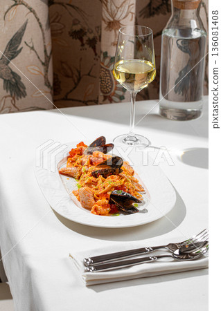 Seafood pasta with mussels shrimp and tomato sauce Seafood pasta with mussels shrimp and tomato sauce 136081408