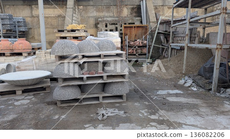 Piles of stone units and completed items prepared for transport Piles of stone units and completed items prepared for transport 136082206