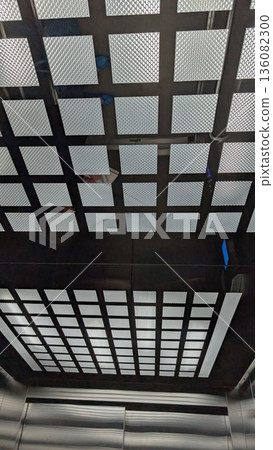 Architecture of elevator interior illuminated by natural light Architecture of elevator interior illuminated by natural light 136082300