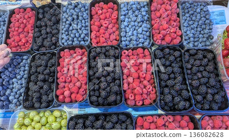 A Colorful and Diverse Assortment of Fresh Berries at a Local Farmers Market Event A Colorful and Diverse Assortment of Fresh Berries at a Local Farmers Market Event 136082628