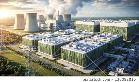 Eco friendly green data center buildings next to nuclear power plant cooling towers sustainable energy supply artificial intelligence concept 136082810