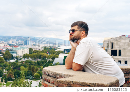 Looking over the city from a high viewpoint in Tbilisi during midday Looking over the city from a high viewpoint in Tbilisi during midday 136083323