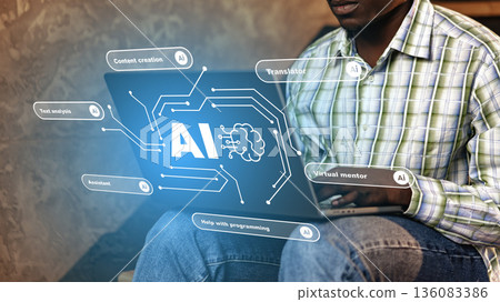 Man using laptop with AI features for different tasks at home Man using laptop with AI features for different tasks at home 136083386