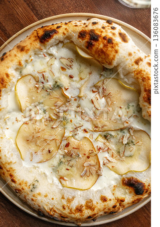 Pizza with pear gorgonzola and cheese Pizza with pear gorgonzola and cheese 136083676