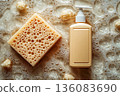 Home cleaning blogs. Top view. Yellow sponge with cleaning agent with soap bubbles. 136083690