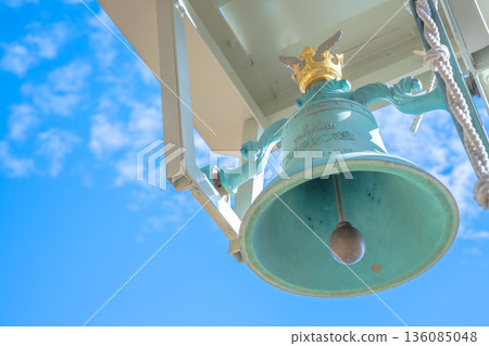 A quiet moment of prayer at the deep mountain requiem bell under the blue sky 136085048