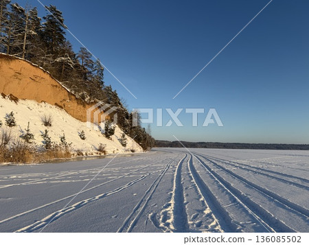 Deep Lake frozen on a sunny day, Kaunas, Lithuania Deep Lake frozen on a sunny day, Kaunas, Lithuania 136085502