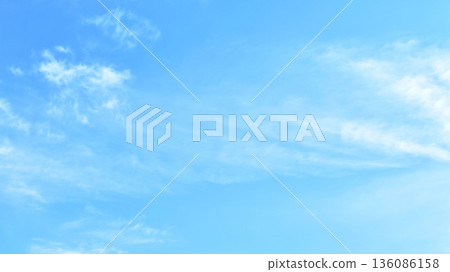 Image of cirrus clouds racing by at breakneck speed - 16:9 (fixed shooting) Image of cirrus clouds racing by at breakneck speed - 16:9 (fixed shooting) 136086158