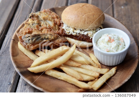 Teriyaki cutlet burger and fried chicken on a plate - fast food 136087049