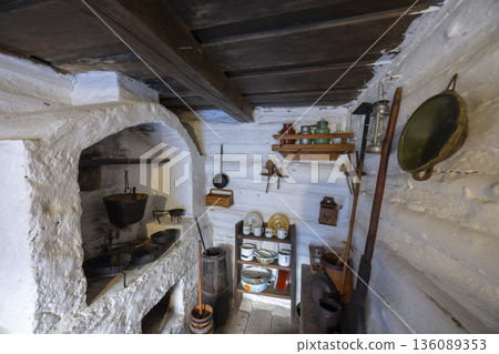 Traditional Slovak rustic kitchen with earthenware stove 136089353