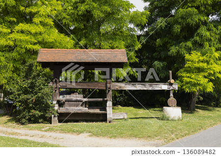 Old wooden wine press in Lower Austria 136089482