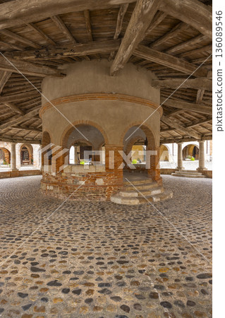 Auvillar covered market hall interior with central well 136089546