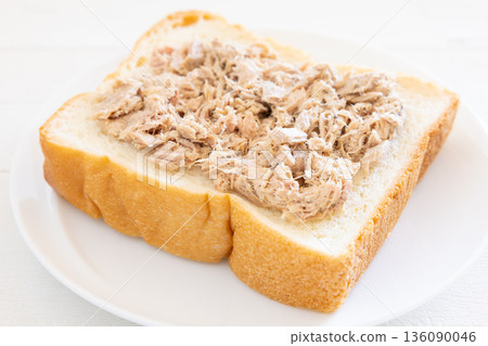Delicious breakfast of thick sliced bread topped with tuna mayonnaise 136090046