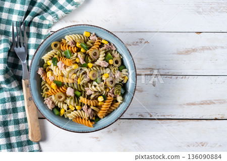 Pasta salad with tuna, corn and olives in bowl Pasta salad with tuna, corn and olives in bowl 136090884