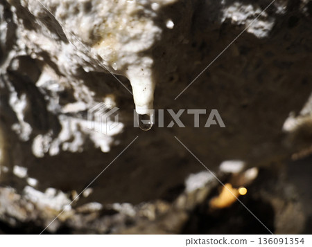 stalactites and stalagmites inside karst caves carved out by water 136091354
