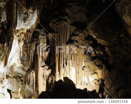 stalactites and stalagmites inside karst caves carved out by water stalactites and stalagmites inside karst caves carved out by water 136091356