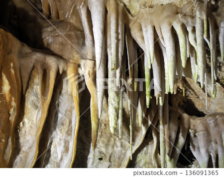 stalactites and stalagmites inside karst caves carved out by water stalactites and stalagmites inside karst caves carved out by water 136091365