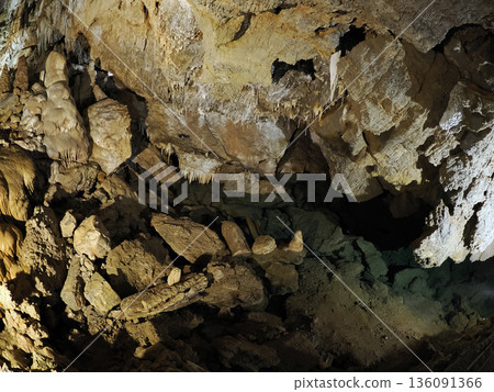 stalactites and stalagmites inside karst caves carved out by water 136091366