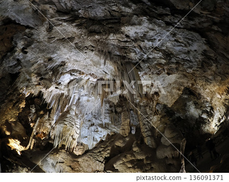stalactites and stalagmites inside karst caves carved out by water stalactites and stalagmites inside karst caves carved out by water 136091371