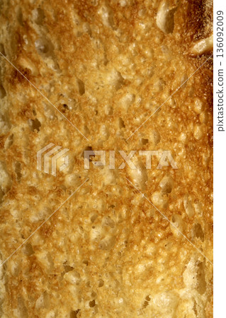Close up of toast bread food texture golden toasted Close up of toast bread food texture golden toasted 136092009