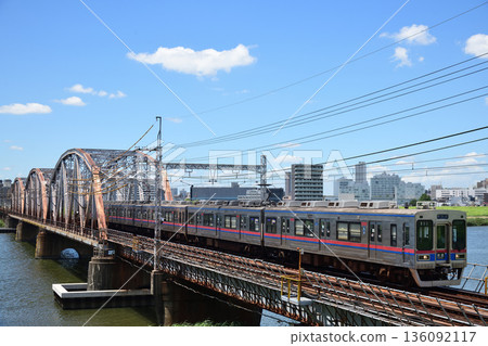 Keisei Electric Railway 3500 series crossing the Arakawa Bridge Keisei Electric Railway 3500 series crossing the Arakawa Bridge 136092117