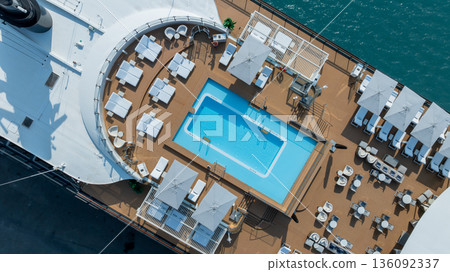 Aerial view luxury ocean cruise ship on clam blue sea, Elegant modern travel lifestyle, Luxury cruise ship liner modern maritime business ocean tourism, Global business cruise ship liner industry. 136092337