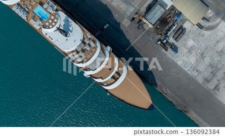 Aerial view luxury ocean cruise ship on clam blue sea, Elegant modern travel lifestyle, Luxury cruise ship liner modern maritime business ocean tourism, Global business cruise ship liner industry. 136092384