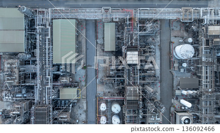 Aerial view oil and gas refinery petrochemical storage tank and pipeline steel, Oil and gas transportation system pipeline steel at oil and gas refinery industry chemical plant, Pipeline oil and gas. Aerial view oil and gas refinery petrochemical storage tank and pipeline steel, Oil and gas transportation system pipeline steel at oil and gas refinery industry chemical plant, Pipeline oil and gas. 136092466