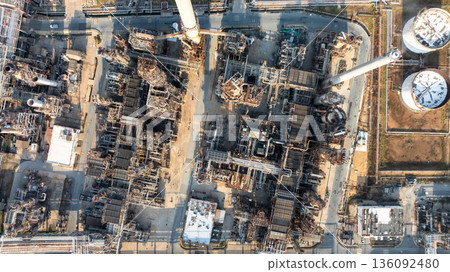 Aerial view of oil and gas petrochemical storage tank and pipeline steel, Oil and gas transportation system pipeline steel at oil and gas refinery industry petrochemical plant, Pipeline oil and gas. Aerial view of oil and gas petrochemical storage tank and pipeline steel, Oil and gas transportation system pipeline steel at oil and gas refinery industry petrochemical plant, Pipeline oil and gas. 136092480