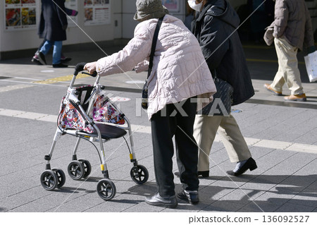 Yokohama cityscape in Japan, with double masks...aging society; elderly women with walkers (masked) and double masks... (Tsurumi Ward, Yokohama) Yokohama cityscape in Japan, with double masks...aging society; elderly women with walkers (masked) and double masks... (Tsurumi Ward, Yokohama) 136092527